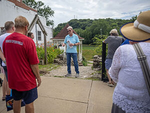 Reggie St. John at the Lithia Well on historic tour